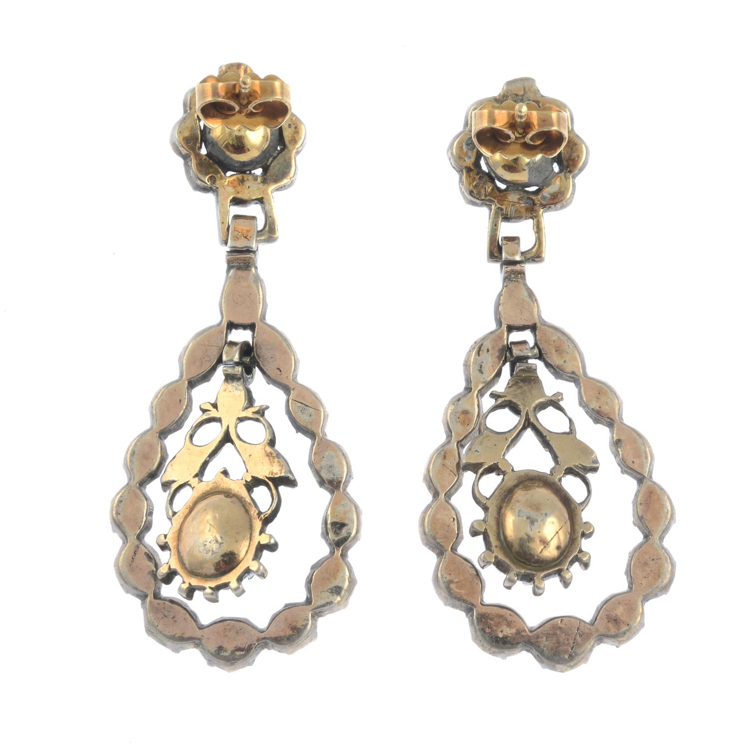 A pair of late Georgian silver and gold rose-cut diamond earrings.Length 4.5cms. - Image 2 of 2