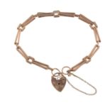 A 9ct gold bracelet, with heart-shape clasp.