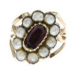 A split pearl and garnet cluster ring.Ring size K1/2.