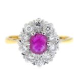 A mid 20th century 18ct gold ruby and brilliant-cut diamond cluster ring.Estimated total diamond