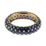A sapphire full eternity ring.Stamped 585.