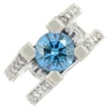 A 'blue' diamond and diamond dress ring.Estimated 'blue' diamond weight 1.50cts.