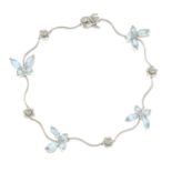 An aquamarine and brilliant-cut diamond butterfly bracelet.Estimated total diamond weight under
