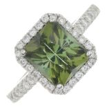 An 18ct gold tourmaline and diamond cluster ring.Tourmaline weight 3.17cts,