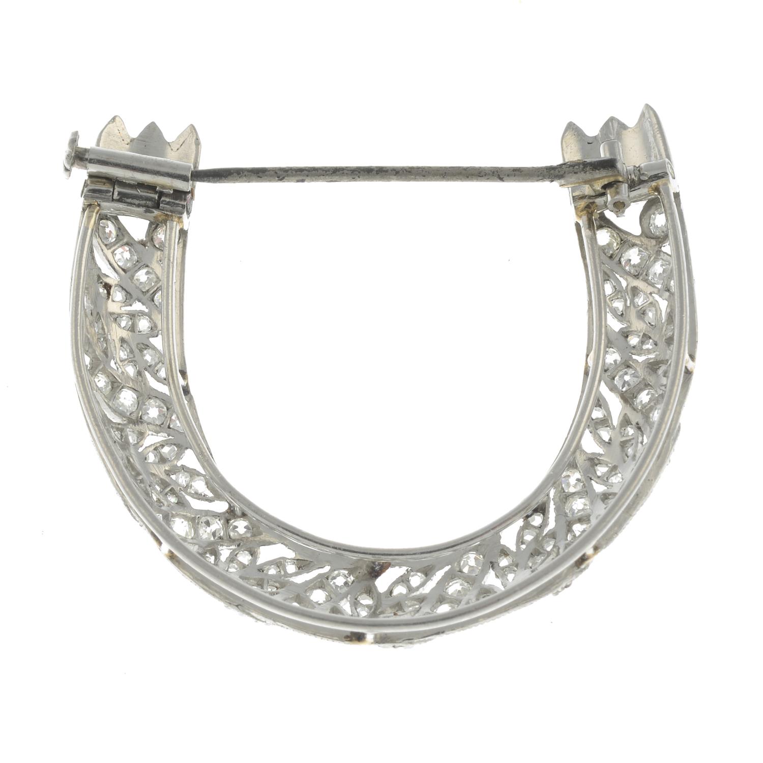 An early 20th century Belle Epoque platinum vari-cut diamond foliate horseshoe brooch.Estimated - Image 2 of 2