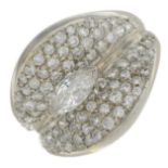 A dress ring, set with a marquise-shape diamond,