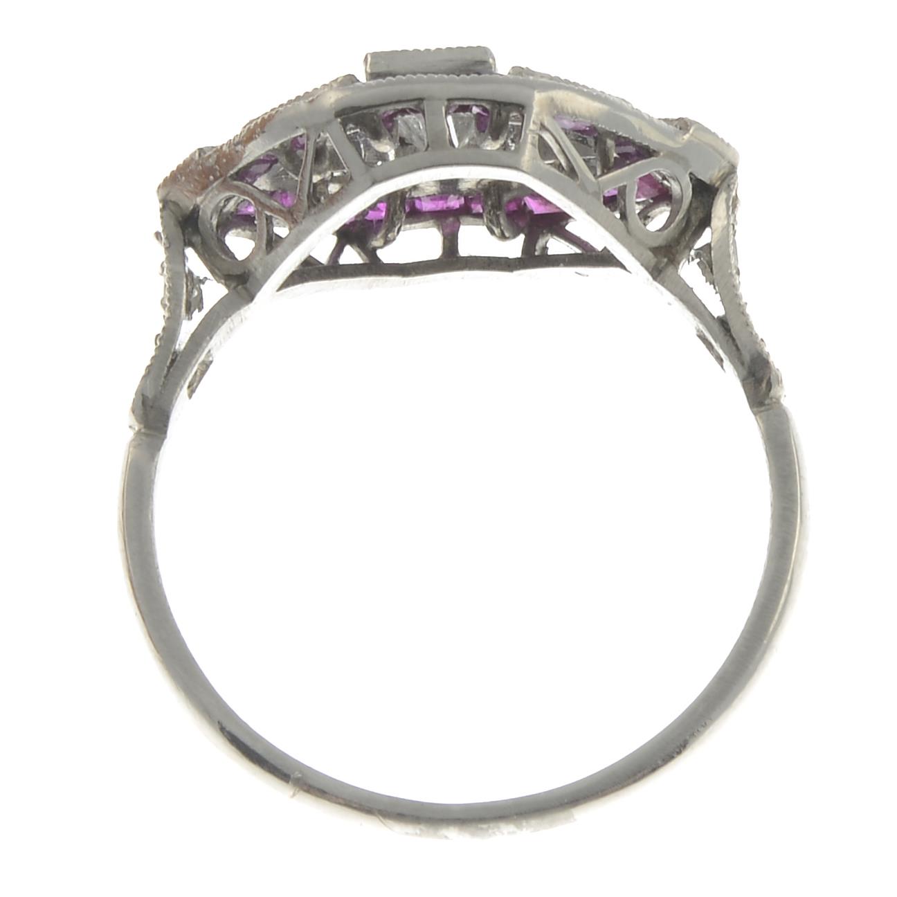 A vari-cut diamond and ruby dress ring.Estimated total diamond weight 0.70ct, - Image 2 of 2