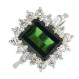 An 18ct gold green tourmaline and vari-cut diamond cluster ring.Tourmaline calculated weight