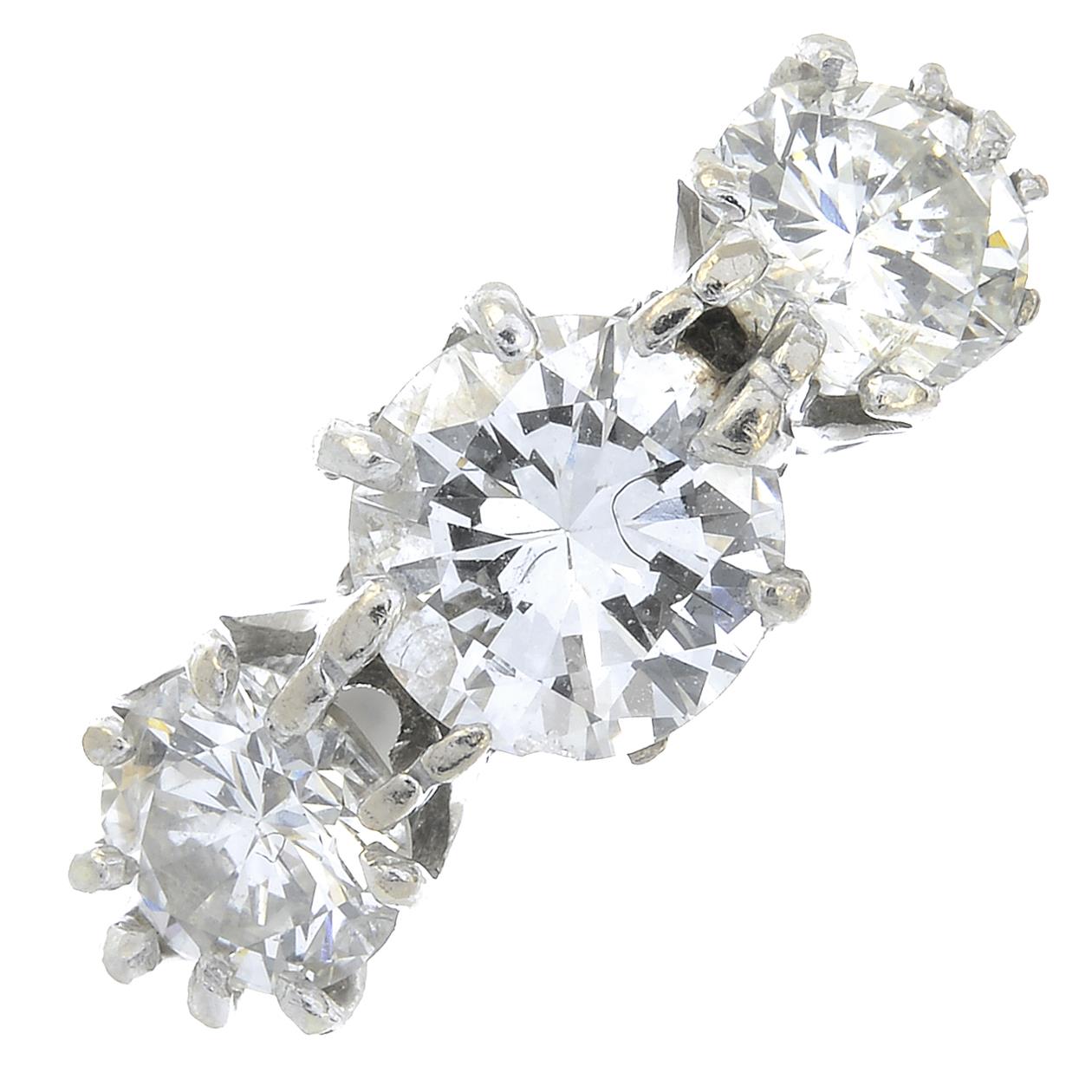 A brilliant-cut diamond three-stone ring.Estimated total diamond weight 1.35cts,