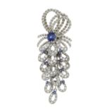 A sapphire and brilliant-cut diamond brooch.Estimated total diamond weight 1ct.Length 5.5cms.