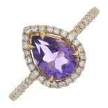 An 18ct gold amethyst and brilliant-cut diamond cluster ring.Amethyst calculated weight 0.76ct,