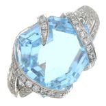 An 18ct gold topaz and brilliant-cut diamond ring.Topaz weight 11.11cts.Total diamond weight