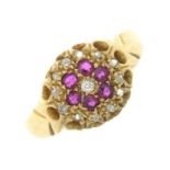 An early 20th century 18ct gold diamond and ruby cluster ring.Hallmarks for Birmingham, 1913.