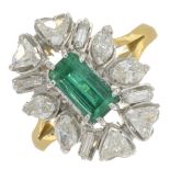 An emerald and vari-cut diamond cluster ring.