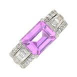 An 18ct gold synthetic pink sapphire and diamond dress ring.