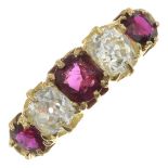 A late Victorian gold graduated ruby and cushion-shape diamond five-stone ring.Estimated total