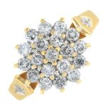 An 18ct gold brilliant-cut diamond cluster ring.Total diamond weight 1ct,