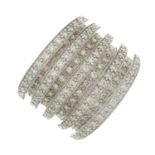 A 9ct gold brilliant-cut diamond multi-row dress ring.Estimated total diamond weight 1.50cts,