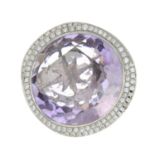 An amethyst and diamond dress ring.