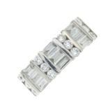 A brilliant and baguette-cut diamond dress ring.Estimated total diamond weight 1.20cts.Stamped