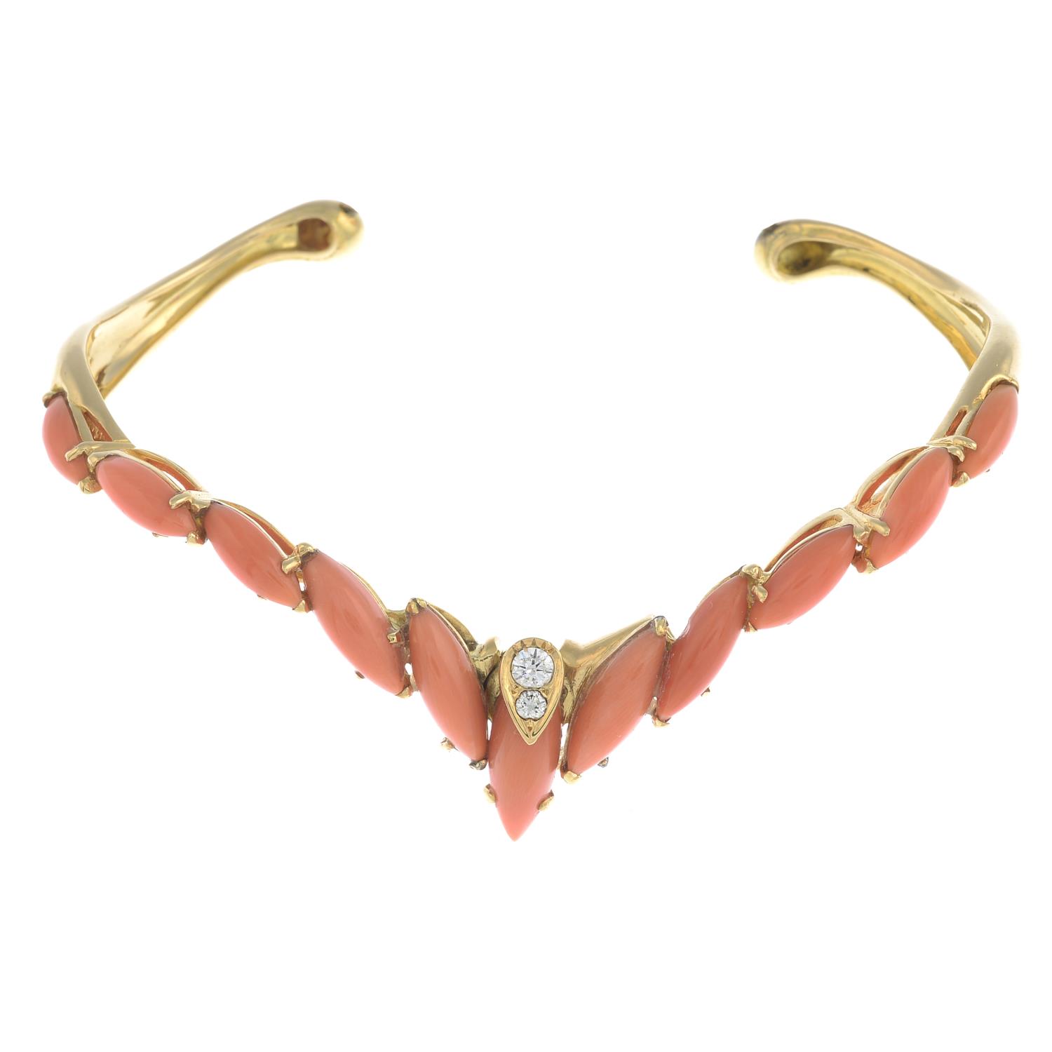 A 1970s 18ct gold coral and diamond chevron-motif cuff bangle,