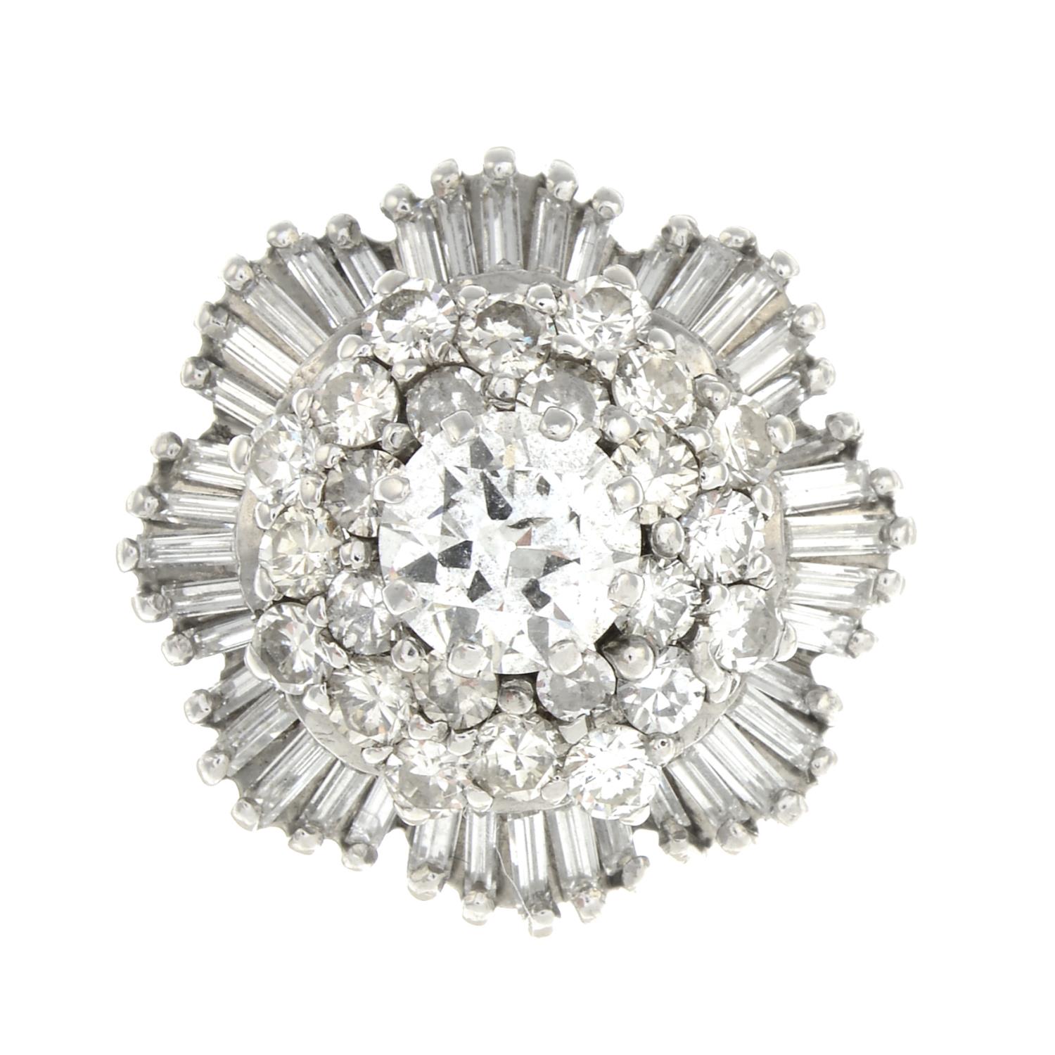 A dress ring, set with a brilliant-cut diamond,