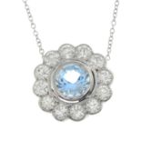A topaz and brilliant-cut diamond pendant,
