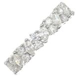 A platinum marquise-shape and brilliant-cut diamond full eternity ring.Estimated total diamond