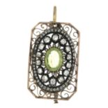 A late 19th century silver and gold peridot and vari-cut diamond pendant.Two rose-cut diamonds