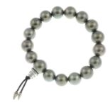 A Tahitian cultured pearl bracelet, with diamond clasp highlight.