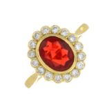 An 18ct gold fire opal and brilliant-cut diamond cluster ring.
