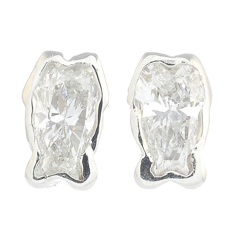 A pair of 18ct gold fancy-shape diamond stud earrings, each cut to resemble a fish.