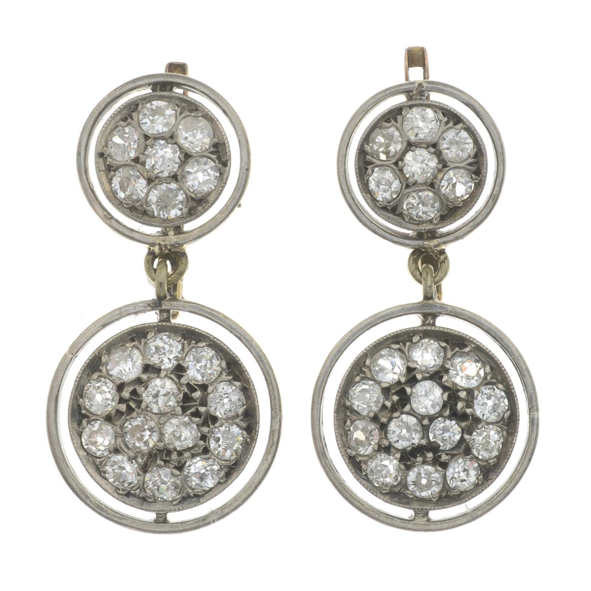 A pair of old-cut diamond cluster drop earrings.Estimated total diamond weight 2.50cts.Length