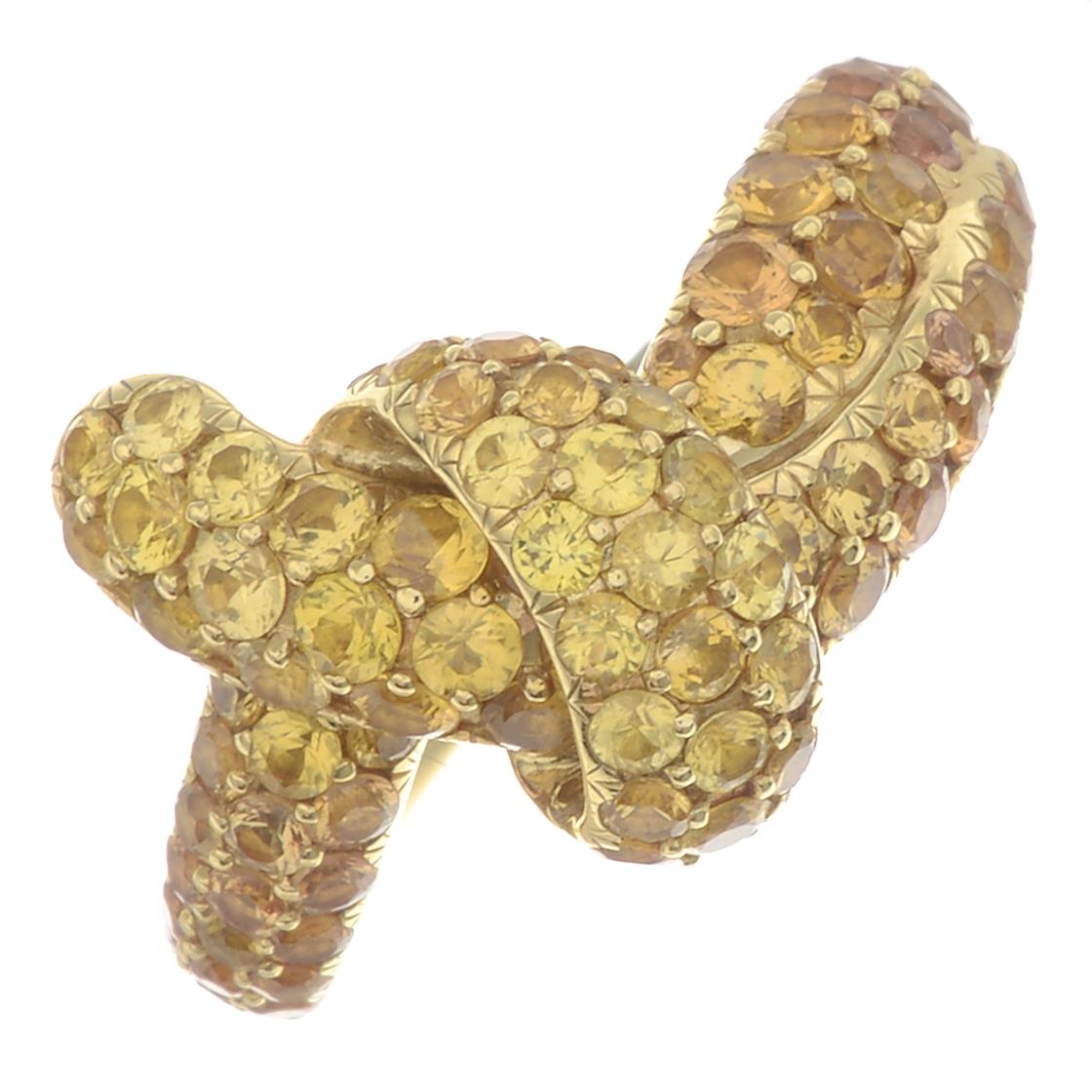 An 18ct gold stylised knot ring,