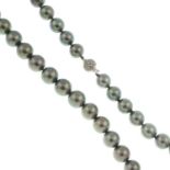 A Tahitian cultured pearl single-strand necklace, with 18ct gold pave-set diamond clasp.