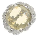 A citrine and diamond dress ring.Citrine weight 29.48cts,