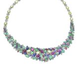 A brilliant-cut diamond and gem-set necklace.Gems to include ruby,