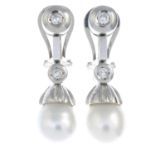 A pair of cultured pearl and brilliant-cut diamond drop earrings.Cultured pearls measuring