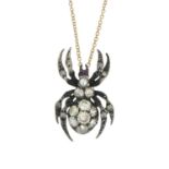 A brilliant-cut diamond and ruby spider pendant,