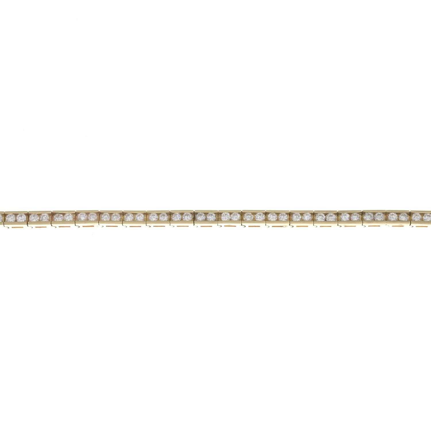 A brilliant-cut diamond line bracelet.Estimated total diamond weight 2.75cts,