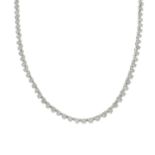 A graduated brilliant-cut diamond line necklace.Estimated total diamond weight 7.50cts,