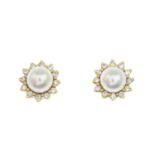 A pair of cultured pearl and brilliant-cut diamond cluster earrings, by Tiffany & Co.