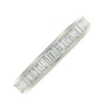 A platinum baguette-cut diamond full eternity ring.Estimated total diamond weight 1.25 to 1.50cts,