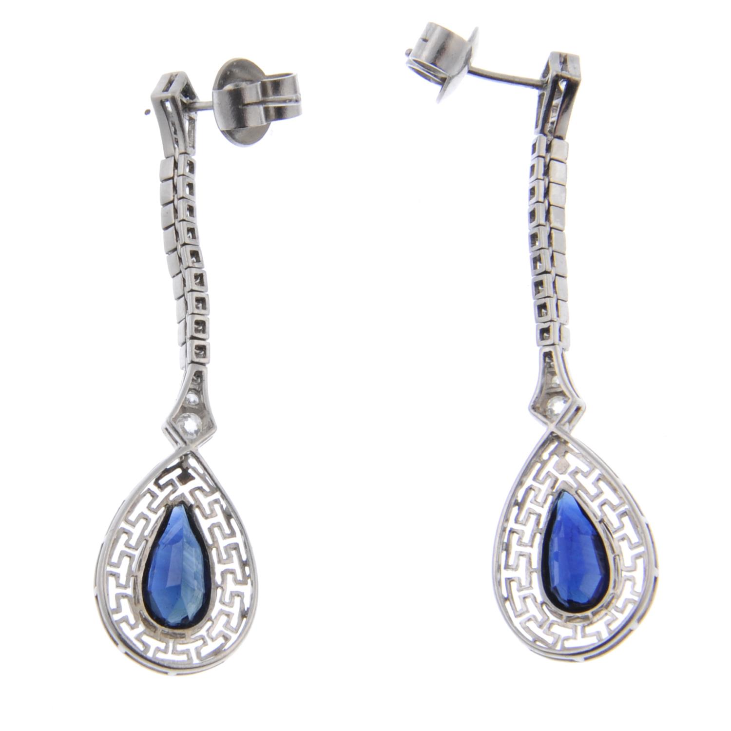 A pair of sapphire and diamond drop earrings.Estimated total diamond weight 0.30ct. - Image 2 of 2