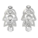 A pair of old-cut diamond openwork earrings.Estimated total diamond weight 0.50ct,