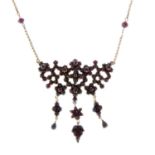 A garnet and red paste necklace.Length 44.5cms.