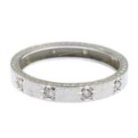 A diamond band ring.Estimated total diamond weight 0.15ct.