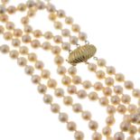 A cultured pearl three-row necklace.