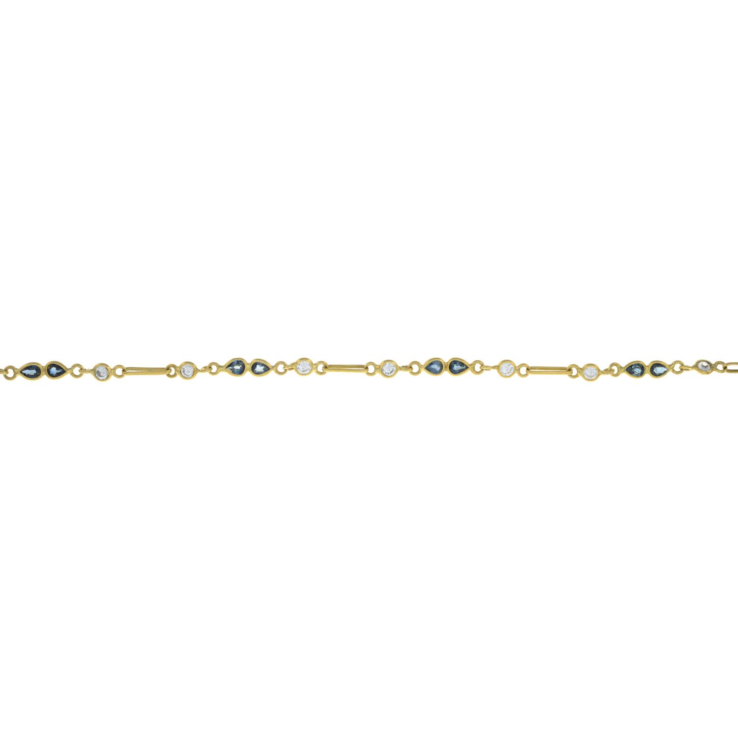 An 18ct gold sapphire and colourless gem bracelet.Import marks for London, 1988.Length 18cms.