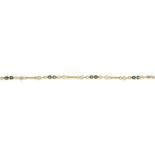 An 18ct gold sapphire and colourless gem bracelet.Import marks for London, 1988.Length 18cms.